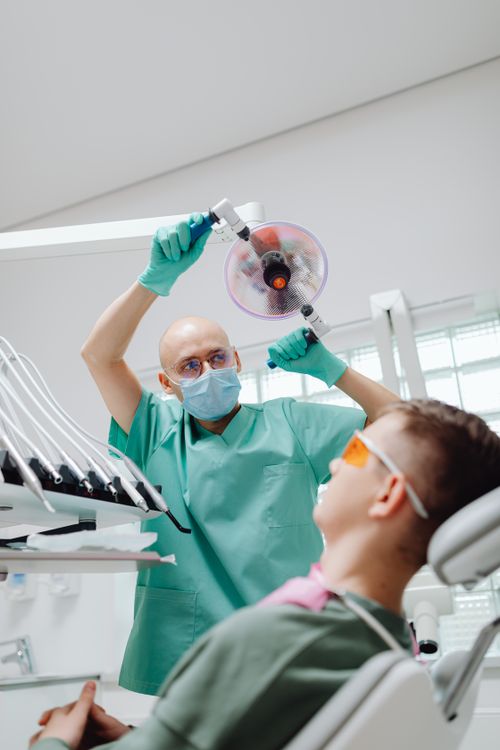 First Month Dental Lab Outsourcing — Week-by-Week Onboarding Guide Dental lab technician reviewing digital case on screen — first month dental lab outsourcing onboarding